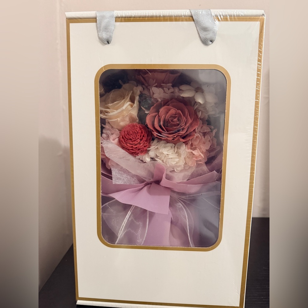 Elegant Floral Arrangement with Pink and Red Accents